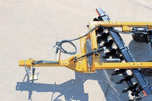Aerial view of F41 Wheel Offset Harrow tongue spring with hydraulic hoses