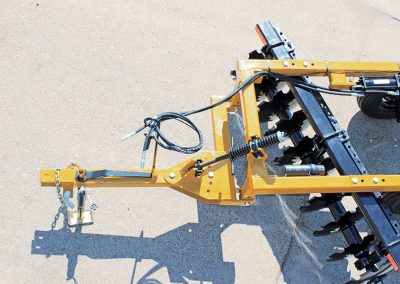 Aerial view of F41 Wheel Offset Harrow tongue spring with hydraulic hoses