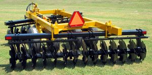 Front view of F42 Wheel Offset Harrow with safety emblem