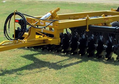 Side view of F42 Wheel Offset Harrow with tongue jack and hydraulic hoses