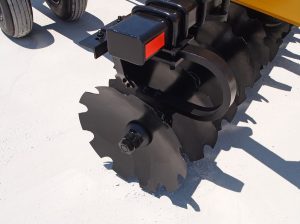 Closeup of J42 Wheel Offset Harrow shock absorber