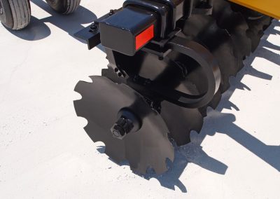 Closeup of J42 Wheel Offset Harrow shock absorber