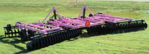 Pink F15 Disc Harrow in the field