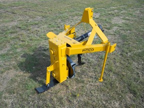 Vertical Rotary Ditcher in the grass