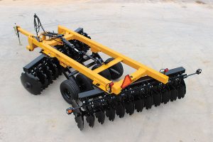 Aerial view of G2 Wheel Offset Harrow with safety emblem