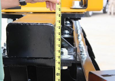 Closeup of G2 Wheel Offset Harrow with measuring tape