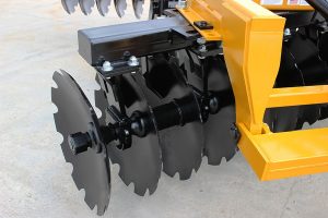 Closeup of G2 Wheel Offset Harrow notched blades with bearings