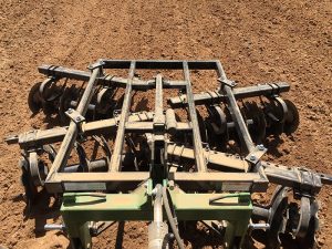 Aerial view of LTF Lift Offset Harrow in the field