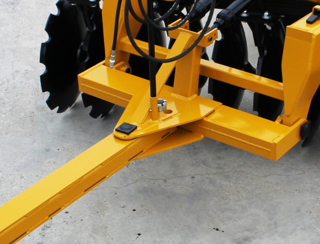 Closeup of G2 Wheel Offset Harrow tongue settings