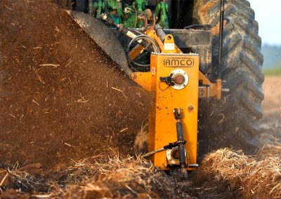 Closeup of Dominator Vertical Rotary Ditcher in the field