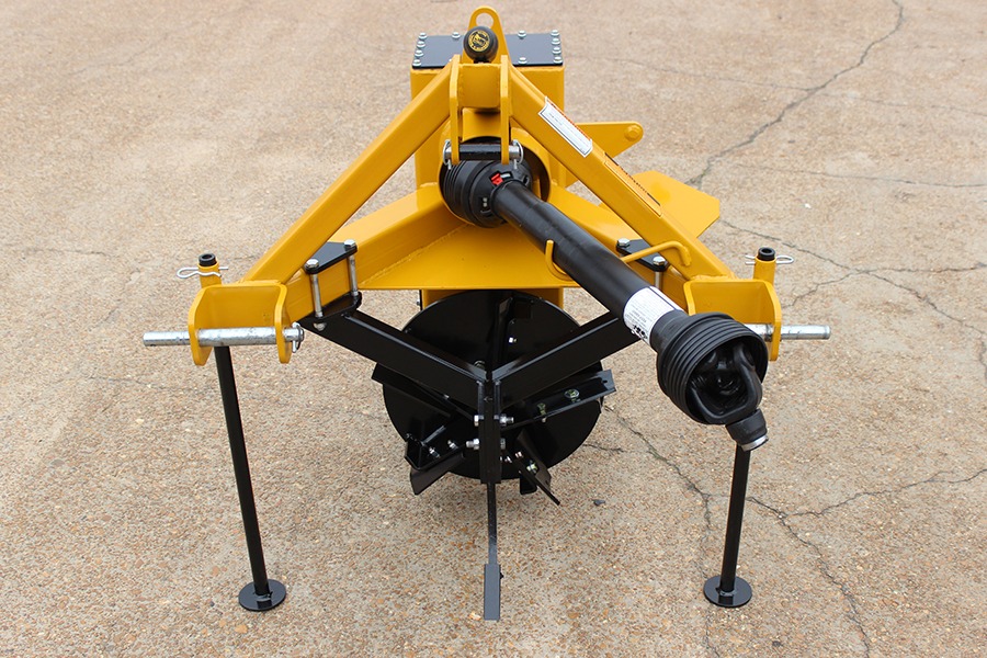 Dominator Vertical Rotary Ditcher cutter head Full view of Dominator Vertical Rotary Ditcher with cutter head on concrete