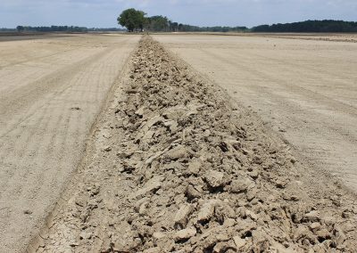 Full view of levee being built with AMCO LJ6 Levee Plow