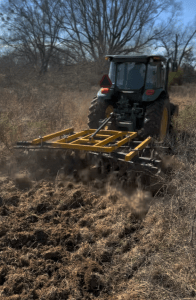 LTF Lift Double Offset Harrow attached to John Deere tractor building fire lanes 