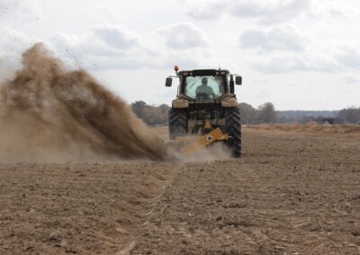 Rear view of Offset Rotary Ditcher digging a trench