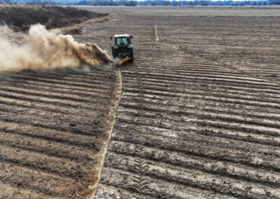 Aerial view of Offset Rotary Ditcher digging a trench