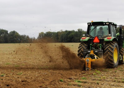 Vertical Rotary Ditcher in field digging trench