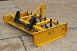 Back of Z-7 on the AMCO lot with skid steer universal adapter and scarifiers