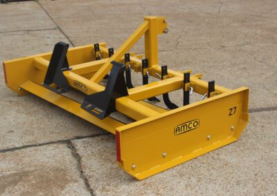 Back of Z-7 on the AMCO lot with skid steer universal adapter and scarifiers