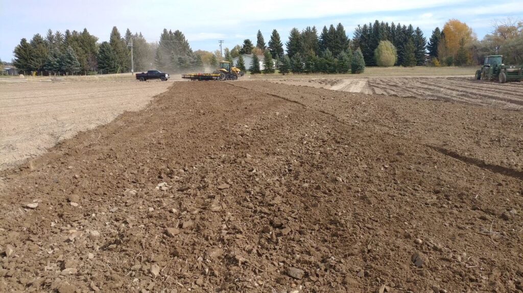 A field in Idaho that has been tilled by an AMCO F15B Double Offset Tandem Disc Harrow
